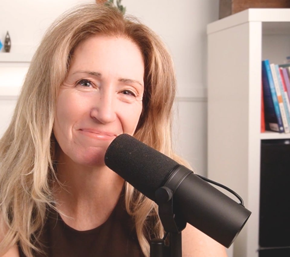 Ilia Grace at her recording microphone
